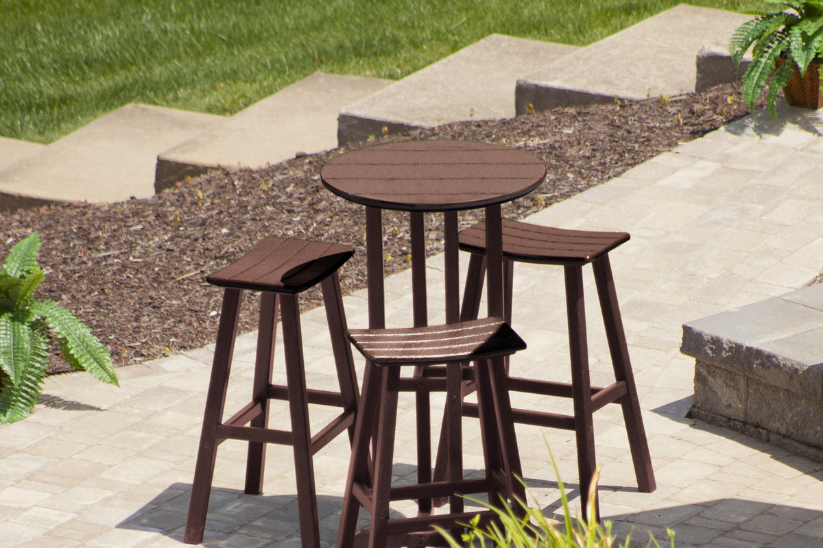 A brown POLYWOOD Contempo 4-Piece Round Saddle Bar Stool Set sits on a patio near mulched landscaping and stone steps.