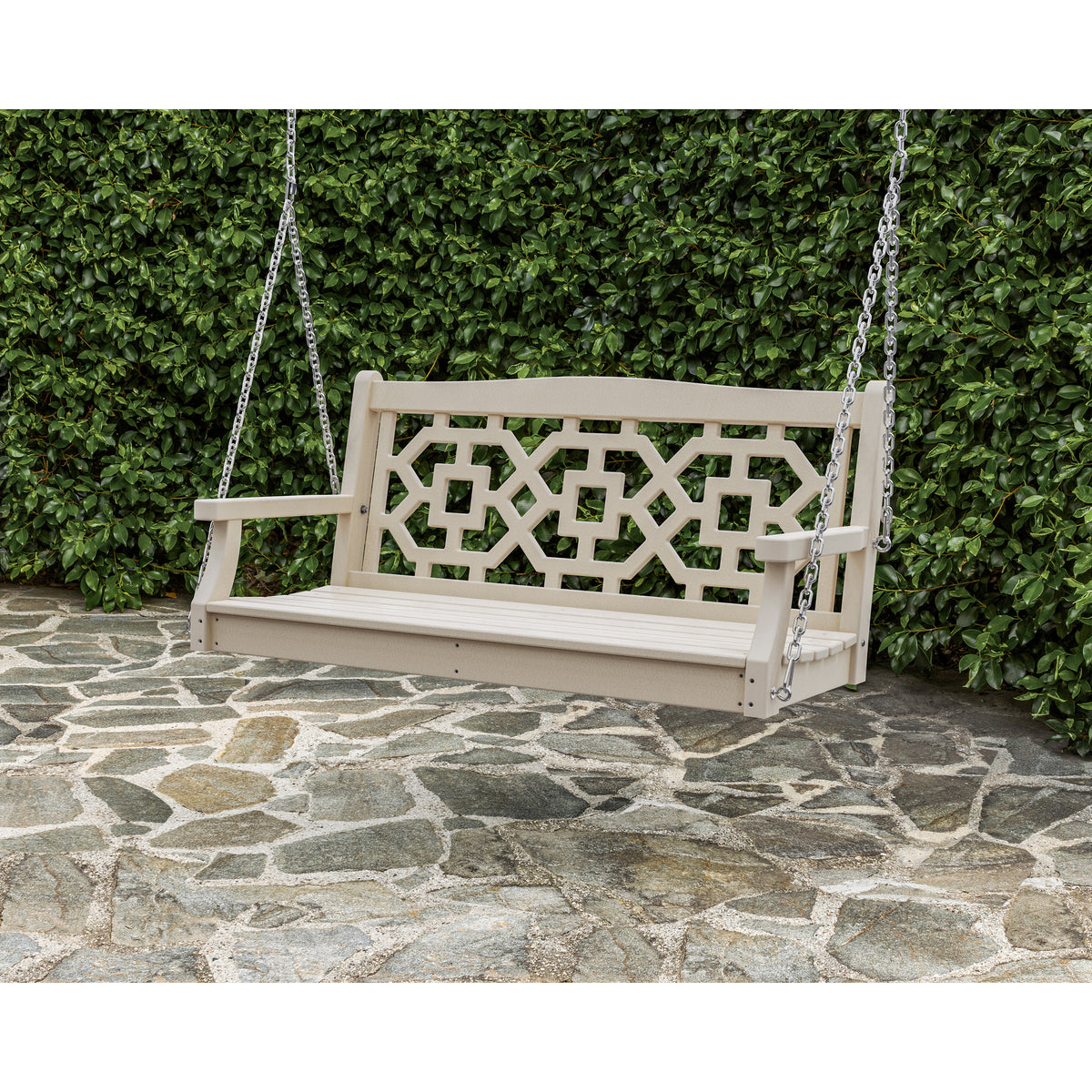 Outdoor swing on stone patio