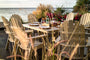 Vineyard Curveback Adirondack 9-Piece Nautical Trestle Dining Set